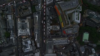 5.5K aerial stock footage of a bird's eye view over Oxford Street, reveal Central St Giles, London, England, twilight Aerial Stock Footage | AX116_056