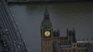 AX116_063 - 5.5K aerial stock footage orbiting Big Ben orbiting River Thames, London England, twilight