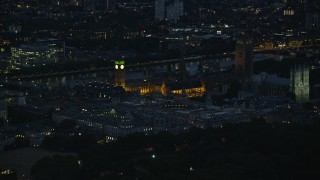 5.5K aerial stock footage of flying by Big Ben, British Parliament and Westminster Abbey, London, England, night Aerial Stock Footage | AX116_189