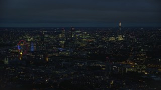 AX116_197 - 5.5K aerial stock footage of Central London skyscrapers and The Shard, London, England, night