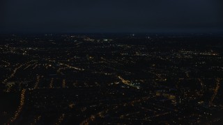 5.5K aerial stock footage of flying by residential neighborhoods in London, England, night Aerial Stock Footage | AX116_202