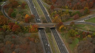 5.5K aerial stock footage of a freeway with light traffic in Autumn, Massapequa, New York Aerial Stock Footage | AX117_007