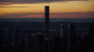 5.5K aerial stock footage of 432 Park Avenue condo high-rise at sunrise in Midtown Manhattan, New York City Aerial Stock Footage | AX118_001E