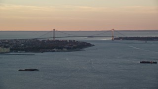 5.5K aerial stock footage of a wide view of the Verrazano-Narrows Bridge, sunrise, New York City Aerial Stock Footage | AX118_080