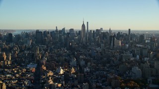 5.5K aerial stock footage of a wide view of skyscrapers in Midtown Manhattan at sunrise in New York City Aerial Stock Footage | AX118_167