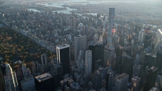 5.5K aerial stock footage of 432 Park Avenue in Midtown at sunrise, Manhattan, autumn, New York City Aerial Stock Footage | AX118_187