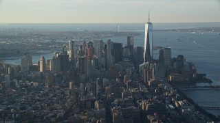 5.5K aerial stock footage of skyscrapers in Lower Manhattan at sunrise in New York City Aerial Stock Footage | AX118_206E