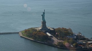 5.5K aerial stock footage of orbiting the side of the Statue of Liberty in Autumn, New York Aerial Stock Footage | AX119_013