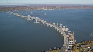 AX119_087 - 5.5K aerial stock footage orbit Tappan Zee Bridge in Autumn, Tarrytown, New York