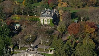 AX119_097 - 5.5K aerial stock footage orbit historic Kykuit Estate in Autumn, Westchester County, New York