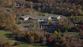 5.5K aerial stock footage of circling around an office building in Autumn, Sleepy Hollow, New York Aerial Stock Footage | AX119_106