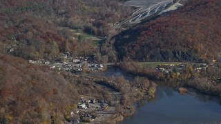 5.5K aerial stock footage orbit inlet and small town industrial shops in Autumn, Peekskill, New York Aerial Stock Footage | AX119_148