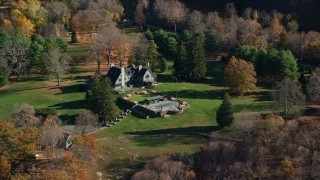 5.5K aerial stock footage orbit isolated mansion in Autumn, Garrison, New York Aerial Stock Footage | AX119_161