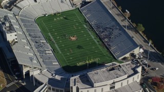 5.5K aerial stock footage fly away from Michie Stadium at West Point Military Academy in Autumn, West Point, New York Aerial Stock Footage | AX119_178