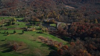 5.5K aerial stock footage of a golf course in Autumn, Garrison, New York Aerial Stock Footage | AX119_187