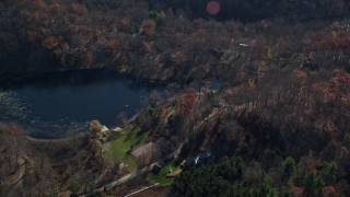 5.5K aerial stock footage of lakeside homes in Autumn, Garrison, New York Aerial Stock Footage | AX119_190