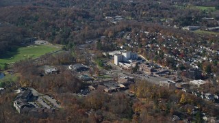 AX119_212 - 5.5K aerial stock footage orbit a small town hospital in Autumn, Mt Kisco, New York