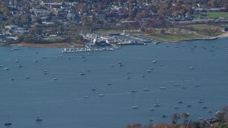 5.5K aerial stock footage of sailboats near a marina in Autumn, Oyster Bay, New York Aerial Stock Footage | AX119_241