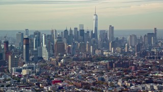 5.5K aerial stock footage of Lower Manhattan's tall skyline seen from Brooklyn in Autumn, New York City Aerial Stock Footage | AX120_082