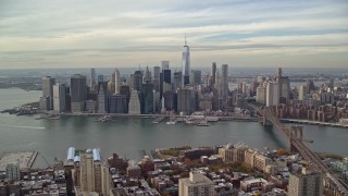 5.5K aerial stock footage of an approach to the Lower Manhattan skyline from Brooklyn, New York City Aerial Stock Footage | AX120_133E