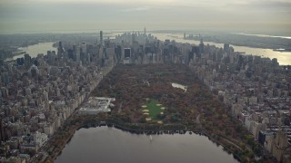 5.5K aerial stock footage fly over Central Park toward Midtown in Autumn, New York City Aerial Stock Footage | AX120_210E