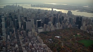 5.5K aerial stock footage approach Midtown bordering Central Park in Autumn, New York City Aerial Stock Footage | AX120_233