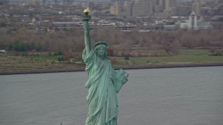 5.5K aerial stock footage orbit front of Statue of Liberty in Autumn, New York Aerial Stock Footage | AX120_254E