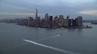 AX121_016E - 5.5K aerial stock footage of the Lower Manhattan skyline at twilight in Autumn, New York City