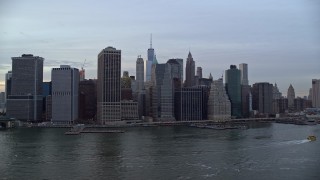 5.5K aerial stock footage of Lower Manhattan riverfront skyline at twilight, New York City Aerial Stock Footage | AX121_021E