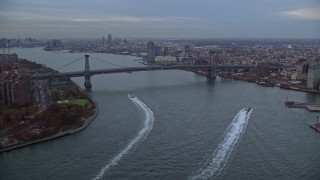 5.5K aerial stock footage of approaching the Williamsburg Bridge at twilight in New York City Aerial Stock Footage | AX121_026