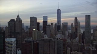 5.5K aerial stock footage of the tops of skyscrapers in Lower Manhattan at twilight in New York City Aerial Stock Footage | AX121_032E