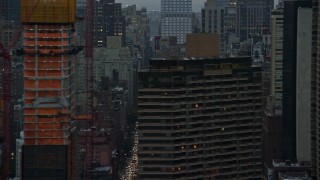 5.5K aerial stock footage of city streets in Midtown at twilight in New York City Aerial Stock Footage | AX121_051E