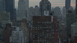 5.5K aerial stock footage flyby streets and Midtown Manhattan skyscrapers at twilight in New York City Aerial Stock Footage | AX121_056E