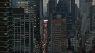 5.5K aerial stock footage flyby high-rises and busy streets on Upper East Side at twilight in New York City Aerial Stock Footage | AX121_060E