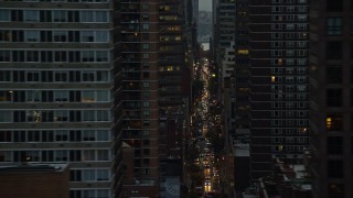 5.5K aerial stock footage of Midtown skyscrapers and busy streets at twilight in New York City Aerial Stock Footage | AX121_064E