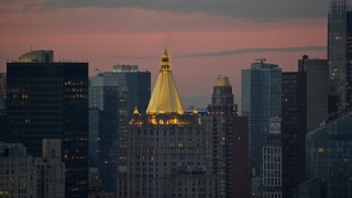 5.5K aerial stock footage of the roof of the New York Life Building in Midtown at twilight in New York City Aerial Stock Footage | AX121_076