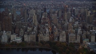 5.5K aerial stock footage approach Upper East Side apartment buildings at twilight in New York City Aerial Stock Footage | AX121_097