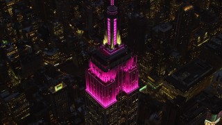 5.5K aerial stock footage approach Empire State Building at twilight in Midtown, New York City Aerial Stock Footage | AX121_127E