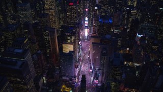 5.5K aerial stock footage orbit Times Square and high-rises at Night in Midtown, New York City Aerial Stock Footage | AX121_133E