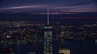 5.5K aerial stock footage of slowly orbiting One World Trade Center in downtown at Night in New York City Aerial Stock Footage | AX121_162E