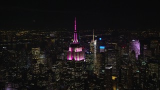 5.5K aerial stock footage of circling the Empire State Building at Nighttime in Midtown, New York City Aerial Stock Footage | AX122_109E