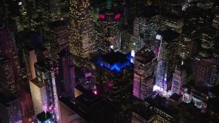 AX122_124 - 5.5K aerial stock footage orbit Times Square at Night in Midtown Manhattan, NYC