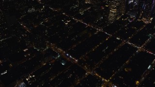 5.5K aerial stock footage orbit city streets in Hell's Kitchen at Night in Midtown Manhattan, New York City Aerial Stock Footage | AX122_128