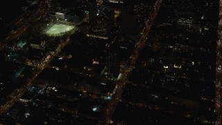 5.5K aerial stock footage orbit Hell's Kitchen apartment buildings and streets at Night in Midtown, New York City Aerial Stock Footage | AX122_215