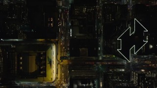 5.5K aerial stock footage of a bird's eye view of 42nd Street through Midtown, reveal Grand Central at Night, NYC Aerial Stock Footage | AX122_227