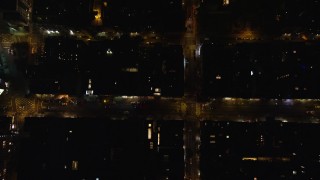 5.5K aerial stock footage of a bird's eye of city streets at Night in Soho, NYC Aerial Stock Footage | AX122_246