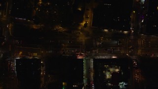 5.5K aerial stock footage of a bird's eye of Houston Street traffic through East Village at Night in New York City Aerial Stock Footage | AX122_252E