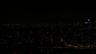 5.5K aerial stock footage of passing Upper West Side high-rises at Night in New York City Aerial Stock Footage | AX123_016