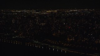 5.5K aerial stock footage of apartment buildings in Morningside Heights at Night in NYC Aerial Stock Footage | AX123_019E