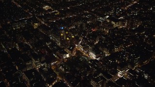 AX123_069E - 5.5K aerial stock footage orbit Beth Israel Medical Center and Union Square in Gramercy at Night in New York City